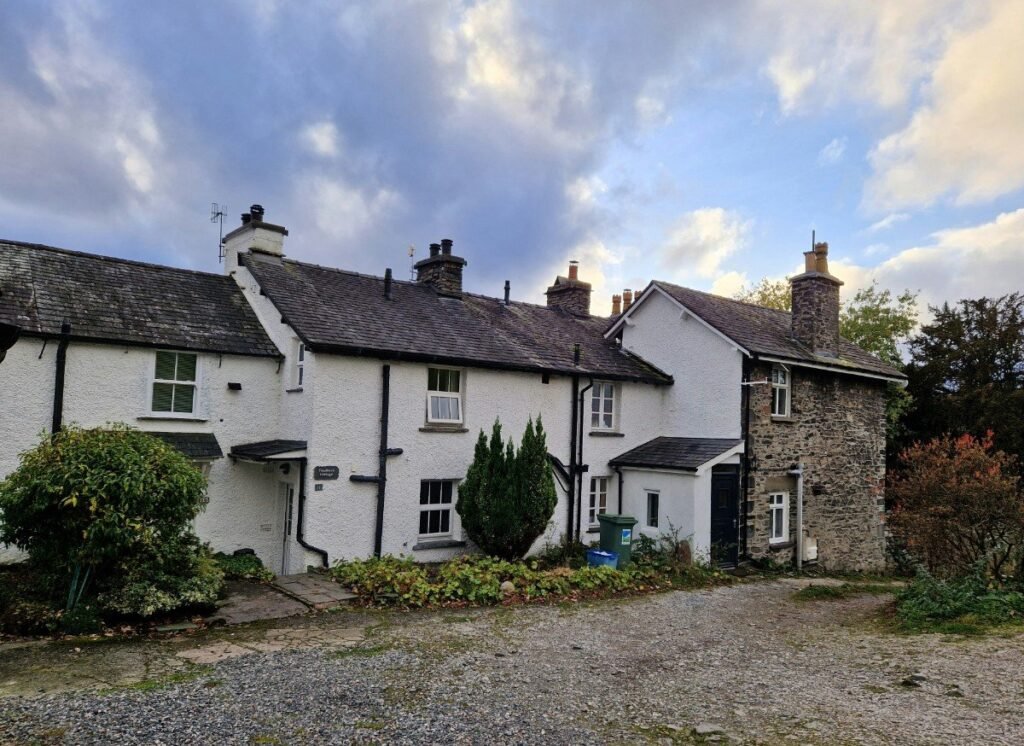 Smoke alarm and fire safety notice in a Cumbria holiday cottage let through Airbnb