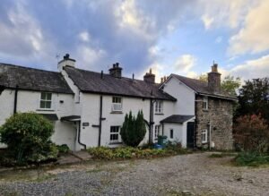 Smoke alarm and fire safety notice in a Cumbria holiday cottage let through Airbnb