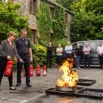 Outdoor food stall with cooking equipment trading at a Cumbria event